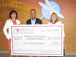 Heidi Sevcik, President and CEO of Gore Mutual and Farouk Ahamed, Chair of the Board of Gore Mutual, presented a donation to Mary Zilney, CEO of Women's Crisis Services.
